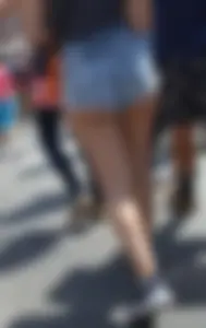Thick booty babe in denim shorts showing her cheeks