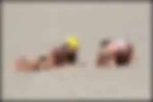 Two hot and sexy girls on the beach in thongs with incredible asses