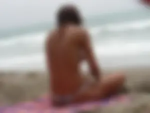 Hot topless girl on the beach in a thong bikini with a nice ass