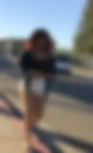 Big boobed redhead walking with no shoes and in shorts