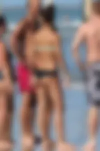 Beach girl out in a bikini with a nice round big booty