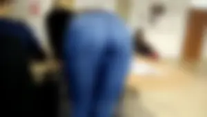 Co-worker bent over table during meeting break