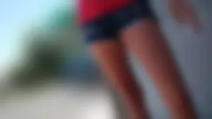 Friend in short shorts showing cheeks and some cleavage