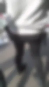 Girl wearing a black skirt over her leggings