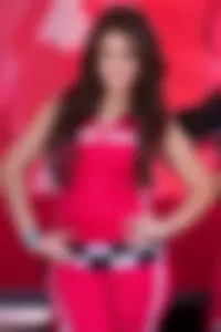 Beautiful and sexy Toyota car girl in red leggings