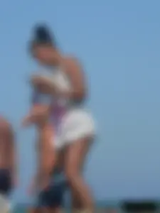 Hot ass topless beach girl with great tits lets her little brother oil up her ass in thong bikini