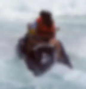Jet ski babe with a nice ass in black thong