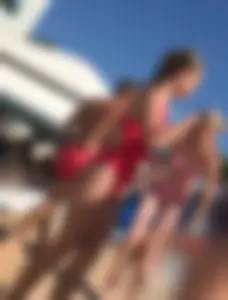 Cute teen with tight ass and little pokies in a red swimsuit
