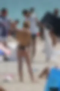 Beach voyeur girls in bikinis, thongs and topless
