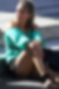 Blonde lady upskirted showing her panties and pussy lips