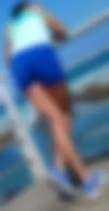 Athletic babe in blue spandex shorts with a nice ass