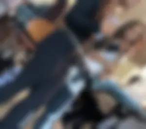 College cheeks filling out black leggings