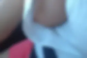 Braless wife showing her titties