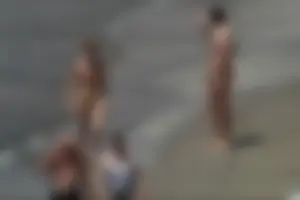 Girls on a nude beach in Sitges, Spain
