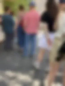 Closeups of a hot girl’s pale legs, she’s wearing a skirt