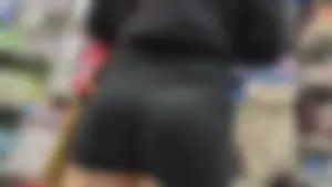 Blonde girl in black shorts