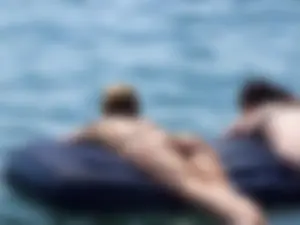 Milf Lying on an Inflatable Mattress Beach Creepshot