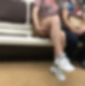 Amazing Hot Girl in a Skirt and Sneakers Sitting Cross-Legged in the Subway Train and on the Escalator Candid Photos Gallery
