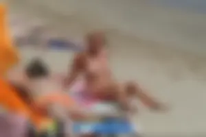 Girls on a nude beach in Sitges, Spain