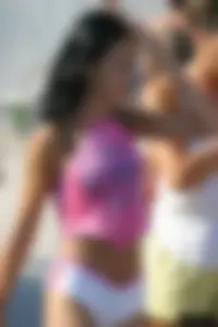 Beach voyeur girls in bikinis, thongs and topless