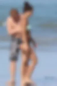 Beach girl out in a bikini with a nice round big booty