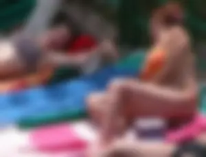 Sexy pool teen with big boobs barely staying in her top