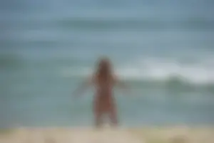 Sexy mature nude beach milf showing it all