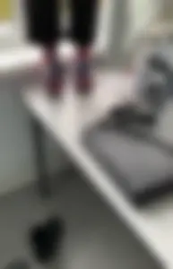 Teen Arts Student in Socks Standing on Tiptoes on Top of the Desk Feet Closeup