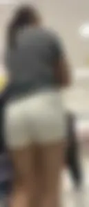 Amazing Asian in white yoga shorts upshot bends squat at Target