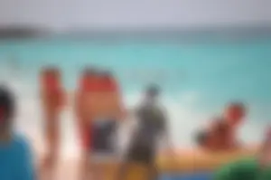 Assortment of sexy babes at the beach in bikinis