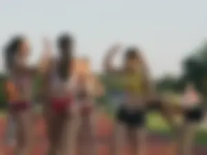 Athlete Girls in Spandex Shorts and Tops at the Stadium Candid