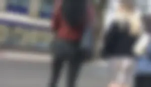 Chav brunette with a nice ass and vpl in tight black leather pants