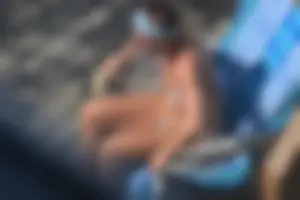 Creepshots of a neighbor milf in a bikini while sunbathing