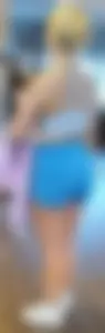Small blonde pawg in light blue pants squatting as low as she can. Frontal view. OC