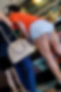 Starbucks girl showing some cheek in loose shorts