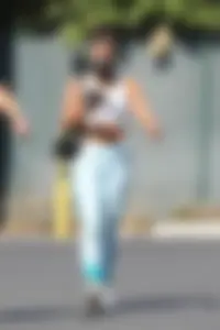 Vanessa Hudgens out in teal patterned leggings