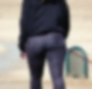 Ass in Purple Leggings
