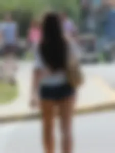 Denim short babe with a wedgie showing some cheeks