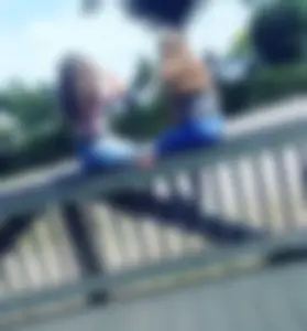 Bunch of teens in shorts and skinny jeans hanging around