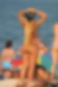 Sexy candid topless and nude beach girls
