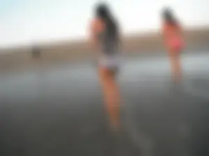 Wet Girl in Swimsuit Walking Our of Water at the Beach Candid Photo