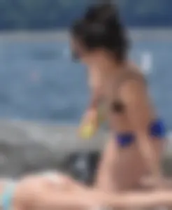Blondie and two asian girls put on sunscreen (pt 2) [062]