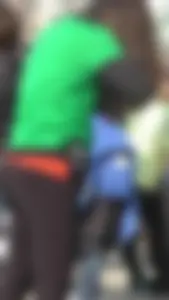 Sexy brunette in see thru leggings stretching before a run with a green thong