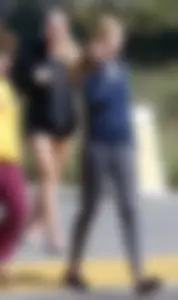 Skinny Arizona State University blonde college girl in grey leggings