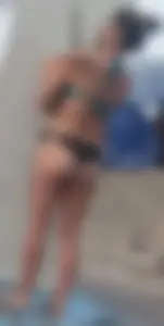 Beach shower milf in semi thong bikini with a nice ass