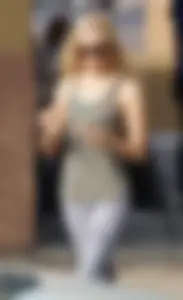 Hot blonde in light leggings after getting Starbucks