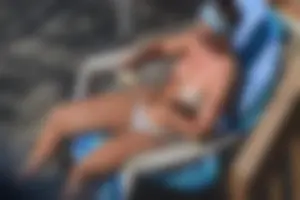 Creepshots of a neighbor milf in a bikini while sunbathing