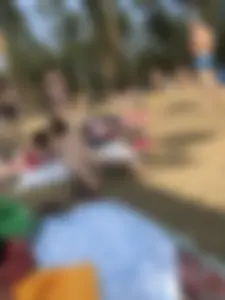 Pale Girl in Swimsuit Lying on a Lake Beach With Her Friends Creepshots Gallery