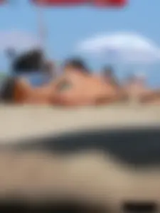2 topless thonged sexy friends on the beach with great bodies
