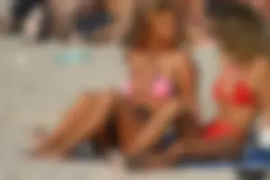 Beach voyeur girls in bikinis, thongs and topless